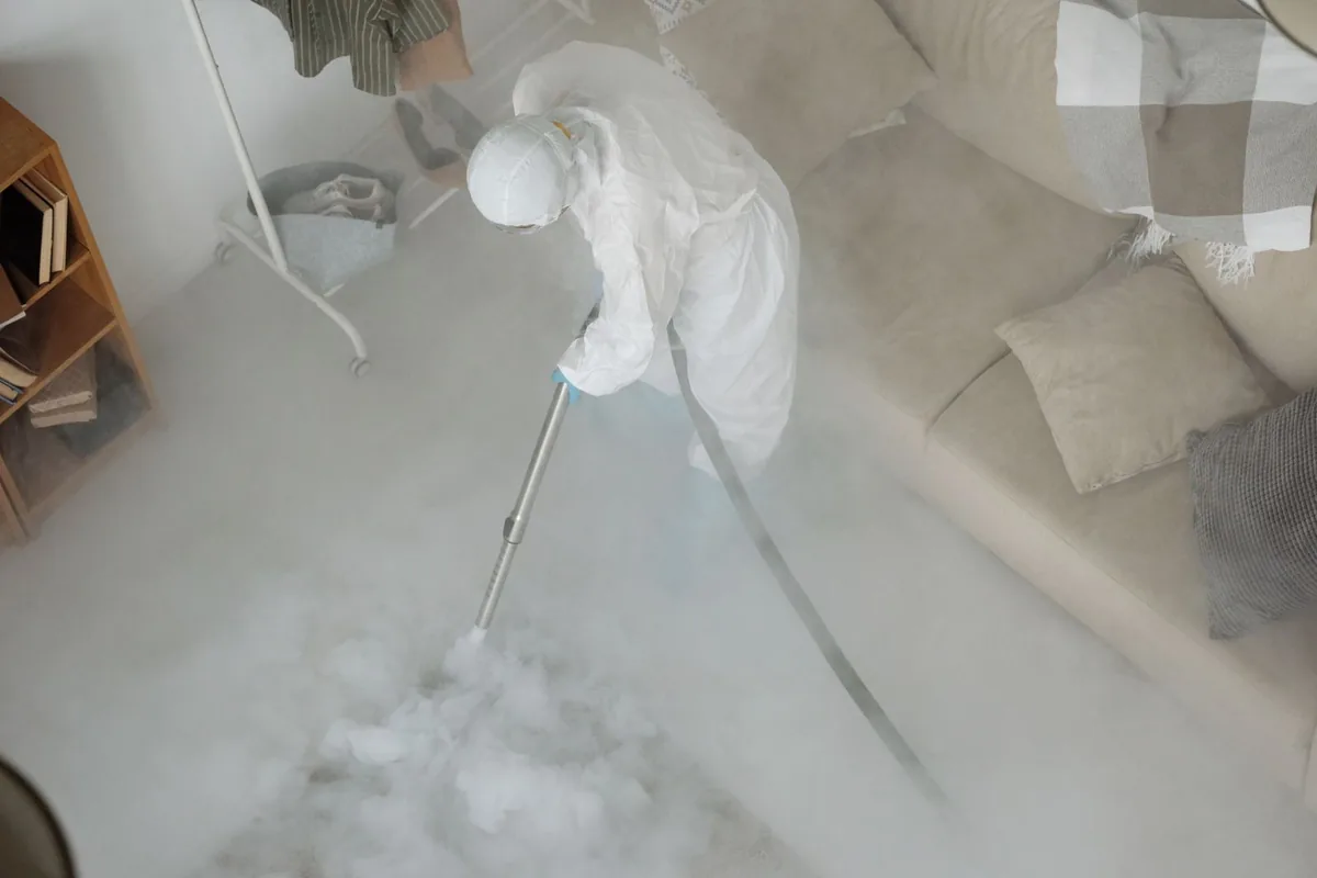 Biohazard cleanup technician in protective equipment, Italian Village, Columbus, OH